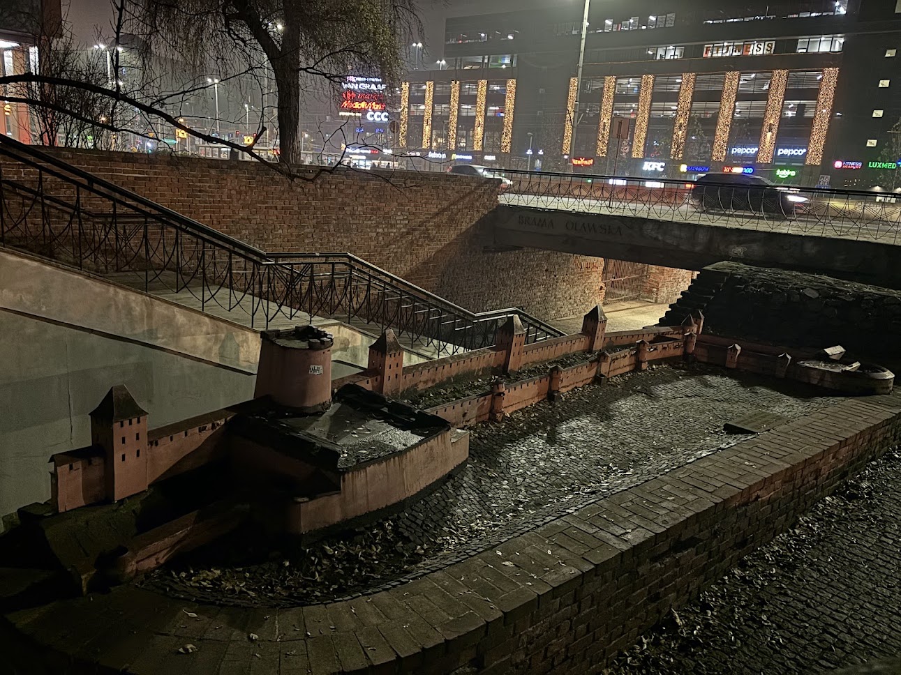 Large mural depicting historical scenes in Wrocław