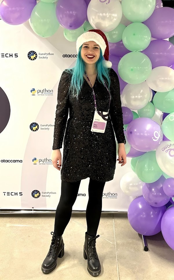 Me smiling at PyCon in Wrocław